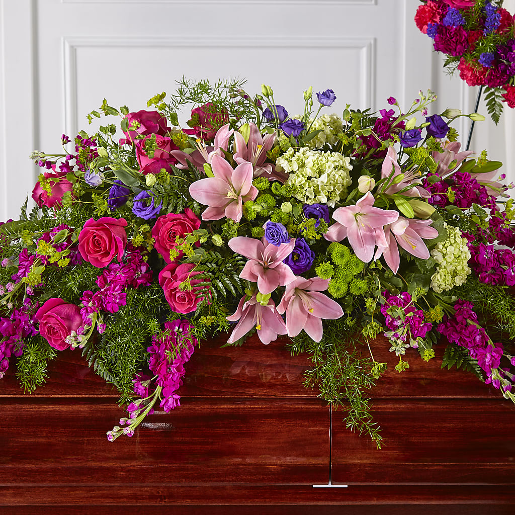Radiant Tribute Casket Spray – Blossom Shop, Traverse City MI