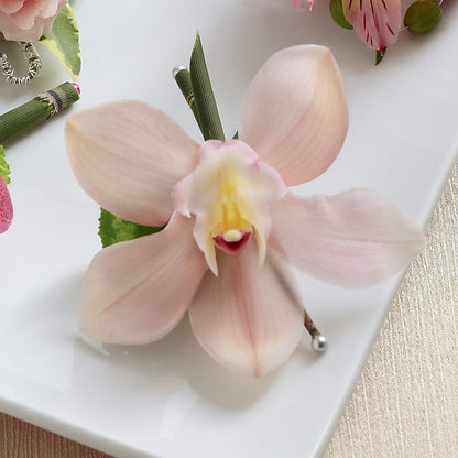 Pink Cymbidium Boutonniere –  Blossom Shop, Traverse City MI
