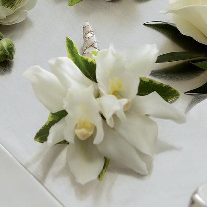 White Mini Cymbidium Boutonniere –  Blossom Shop, Traverse City MI